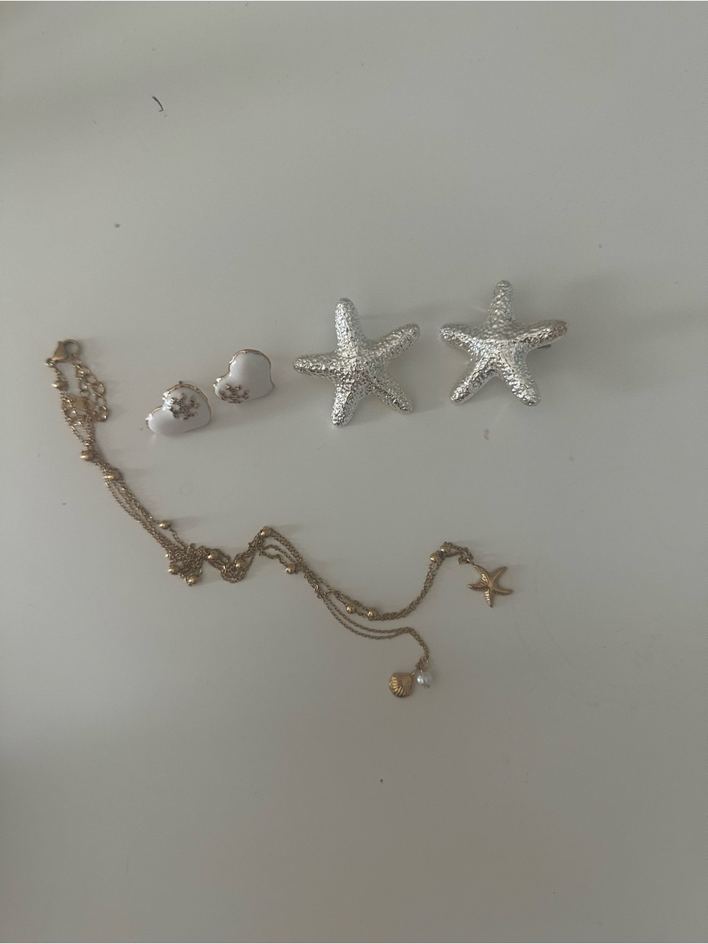 Gold Starfish Charm Necklace with White Heart & Silver Starfish